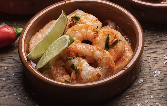 Hvitløksmarinerte scampi